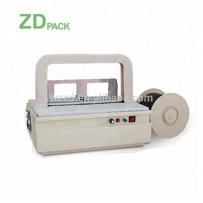 خرید ماشین کوچک خودکار بند زدن میز دستگاه بسته بندی الکترونیک online manufacture